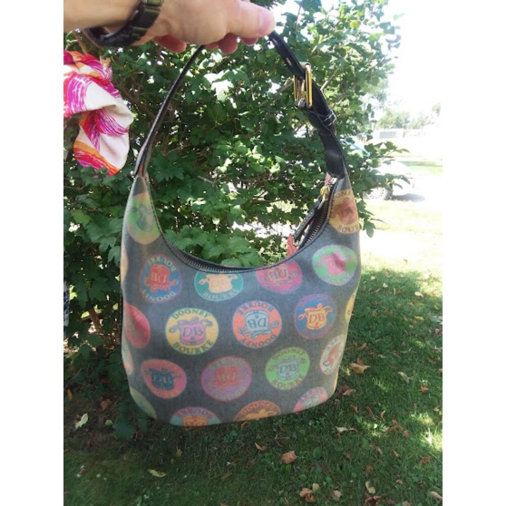 Vintage Dooney and Bourke Medallion Logo Coated Crescent Shoulder Bag Black